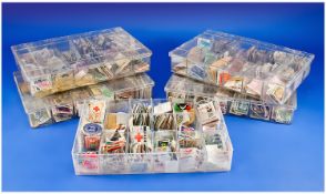 Tens of Thousands fo Mostly Commemorative Stamps from all over the world. In five plastic boxes.