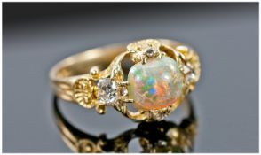 18ct Gold Opal And Diamond Ring,  Central Polished Opal Cabochon, Showing Flashes Of Blues And