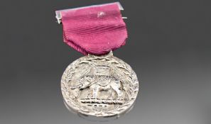 The Worshipful Company Of Cutlers. A Scarce Silver Medal Of Oval Shape below a silver bar