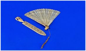 Carved Bone Fan And Paper Knife With Reticulated Fork And Carved Elephant Finial.