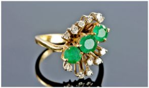 18ct Gold Diamond And Emerald Dress Ring, Set With Three Central Round Cut Emeralds Between 12