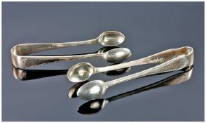 Two Pairs of Silver Sugar Tongs, one pair by Walker and Hall, hallmarked for Sheffield 1928,