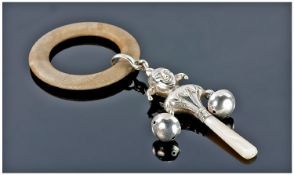 A Silver Figural Baby`s Rattle In The Form Of A Jester. Hallmark Birmingham 1936. 5.5`` in length.