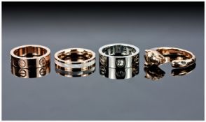 Four Plated Stainless Steel Modern Dress Rings Sold As Found.