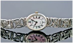 Rotary Ladies Silver Wrist Watch With Mother Of Pearl Dial. Stamped sterling silver to watch case