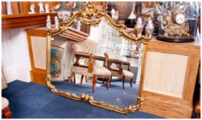 Contemporary Gilt Framed Wall Mirror, in the Rococo style, with acanthus leaf decoration, measuring