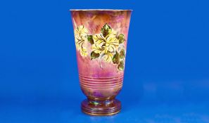 Large Royal Winton Grimwades Vase, decorated with floral pattern on a lustre pink ground, raised on