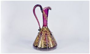 Bohemian Late 19th Century Amethyst Glass Ewer with gold figural decoration. c.1880`s. 9 inches