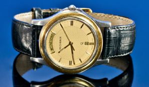 Gents Bucherer Wristwatch Gilt Dial, Baton Numerals And Hands With Day Date Aperture At 12 And 6 O`
