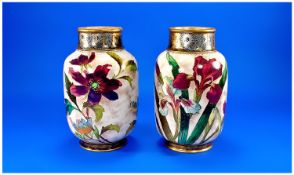 Pair of Doulton Hand Painted Floral Vases of slightly bulbous column shape with small circular dark