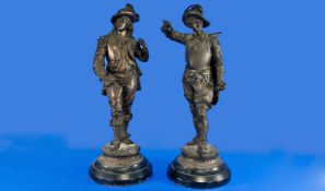 French 19th Century Pair Of Bronzed Spelter Cavalier Soldier Figures raised on circular stepped