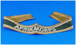 An Original Afrika Korps Silver Thread Arm Band/Cap Band. 1939-1945 War.