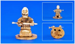 Modern Ivory Coloured and Wooden Skeleton Samurai Netsuke.