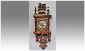 Gustav Becker 1819-1885 Fine Walnut Carved Regulator Wall Clock. The porcelain dial with sunburst