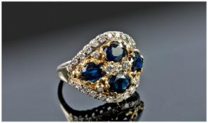 18ct Gold Diamond And Sapphire Cluster Ring, Set With Four Dark Blue Sapphires Surrounded By Round