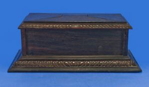 Early 20th Century Oak Ebonised Lidded Box, inscribed AD. 1925, in the form of an early chest,