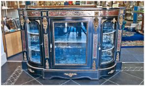 Mid Victorian Ebonised Credenza, circa 1865, with curved ends, the top frieze decorated with Boulle