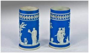 Pair of Blue and White Jasper Ware Vases. 4.5 inches high. Classical scenes.