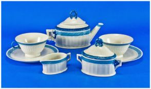 Royal Copenhagen Breakfast Service, comprising teapot, sugar pot, milk jug, with cups and saucers,