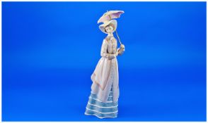 Lladro Figure `Parisian Lady`. Mark number: 5321. Issued 1985-1995. 9.75`` in height.