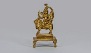 A Fine Quality Indian Brass Shrine Figure Of A Four Armed Deity Riding A Sacred Bull with refined