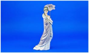 Lladro Figure `Milanese Lady`. Model number: 5232. Issued 1985-1994. 10.25`` in height.