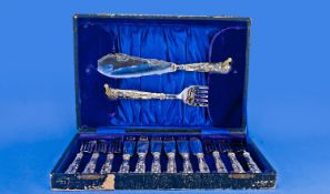 Silver Handled Ornate and Embossed Set of Fish Servers, comprising 6 forks, 6 knives, plus a large