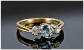 9ct Gold Diamond Ring, Set With a Central Blue Stone Between Two Round Cut Diamonds, Fully