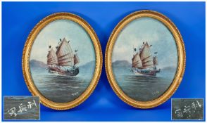 A Pair Of Chinese Oval Oil Paintings On Canvas of sailing junks at sea in full sail with the shore