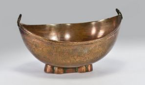 A Middle Eastern Engraved Copper Beggars Bowl Of Traditional Form. Decorated with flowers and