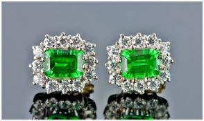 Pair of 18ct Gold Earrings, Set With A Central Emerald Cut Green Stone Surrounded By White Faceted