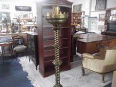 A Fine Quality Brass Victorian Gothic Style Floor Candle Stick Of Large Size, with a rope twist