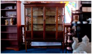 Edwardian Mahogany Display Cabinet, the top with moulded and inlaid rail to back, fitted with two
