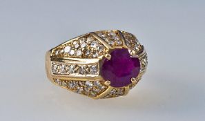 14 Carat Gold Ceylon Ruby and Diamond Cluster Ring, the ruby 1.5 carats est weight, diamond 1.00