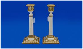 Pair of Royal Worcester Candlesticks of Classical Square Sectioned Form, the sconces with baluster
