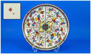 A Chinese Decorated Plate. 12`` in diameter. Profusely decorated with flowers & birds in thick