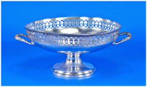 Walker and Hall - Silver Two Handled Pedestal Bowl. With openwork borders. Circular stepped base.