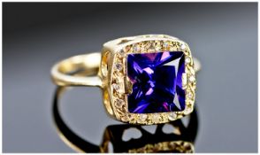 18ct Gold Amethyst And Diamond Ring, Set With a Central Square Shaped Amethyst Surrounded By Round
