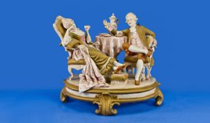Large Royal Dux Figure Group, showing a lady and gentleman in 18th century dress, taking tea; the