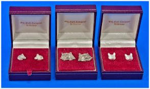 Three Pairs Of Silver Earrings, The Fronts Modelled In The Form Of Cats, Horses And Fox Heads.