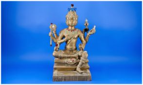 Large Cast Brass Indian Temple Deity Figure with 8 arms & 4 faces. Encrusted with paste jewels.