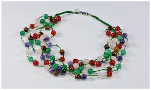 Multi Gemstone Five Strand Necklace comprising round beads of Brazilian amethyst, tiger eye,