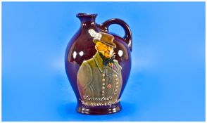 Royal Doulton Treacle Glaze ``Micawber`` Dewars Whisky Jar. c.1900-10. Height 7.25 inches. Mint