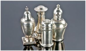 A Small Collection Of Early 20th Century Silver Pepper Pots. Various hallmarks & sizes. 4 in total.