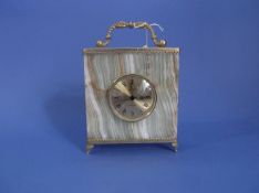 Straiger Quartz Onyx Cased Mantle Clock, with gilt handle to top, brass edging, raised on cast