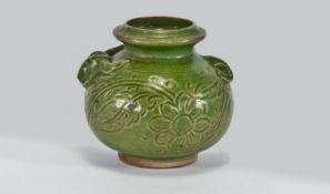 A Fine Quality Celadon Glazed Jar Of Globular Form with an incised carved decoration depicting