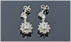 18ct White Gold Diamond Drop Earrings, Each Set With Two Round Modern Brilliant Cut Diamonds And A