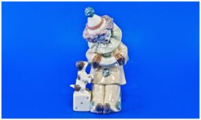 Lladro Figure of a Clown, Pierrot with Concertina, model number `5279`, issued in 1985 measuring 5½