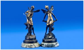 Pair of Bronze & Brass Mythical Figures, signed to back indistinctly, 9 inches high.