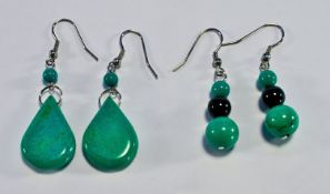 Two Pairs of Turquoise Drop Earrings, one of teardrop shape below a small round turquoise, all